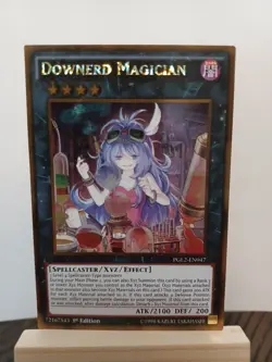Downerd Magician PGL2-EN047 Gold Rare 1st Edition Lightly Played - Image 1