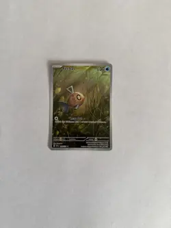 Feebas 198/191 Sv08: Surging Sparks Holo Pokemon Card Full Art Water Type - Image 1