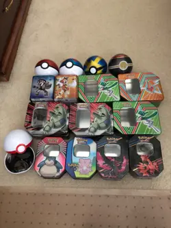 lot of 16 empty pokemon TCG tins (with coins!) - Image 1