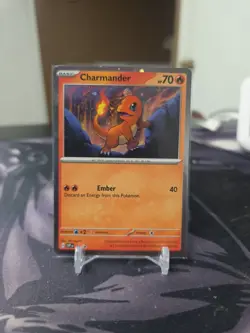 Charmander - 047 (Cosmos Holo) 047 Sv: Scarlet & Violet Promo Cards Holo - Image 1