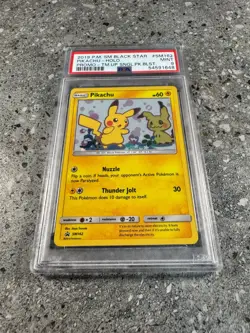 Pokemon TCG Cards Pikachu SM162 Black Star Promo Holo PSA 9 MINT - Image 1
