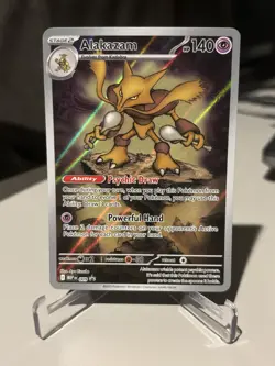 2025 Pokemon Mega Evolution #009 Alakazam Black Star Promo - Image 1