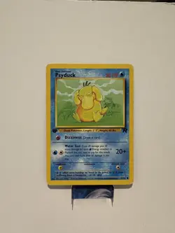 💥 1st Edition Stamp Psyduck Non Holo WOTC Pokemon Card 65/82 Rocket Set 1999 LP - Image 1