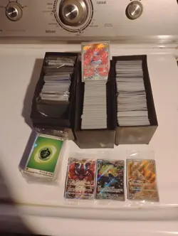 bulk pokemon +200 and promo and energy cards - Image 1