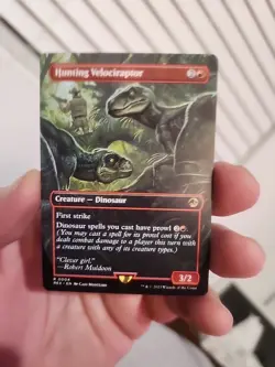 Magic the Gathering NM Hunting Velociraptor (Borderless) Jurassic World - Image 1