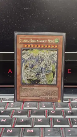 Yugioh Stardust Dragon/Assault Mode DPCT-EN003 Secret Rare Limited Edition LP - Image 1