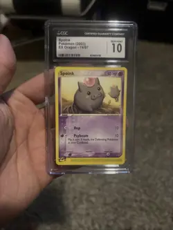 CGC 10 Spoink 74/97 EX Dragon 2003 Pokemon Card - Image 1