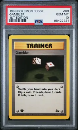 1999 POKEMON FOSSIL 1ST EDITION #60 GAMBLER PSA 10 - Image 1