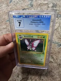 CGC 7 Venomoth 1999 Jungle 13/64 Holo Pokemon Card Nice See Pics J - Image 1