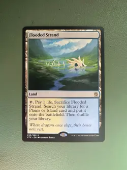 Flooded Strand Khans of Tarkir Regular - Image 1