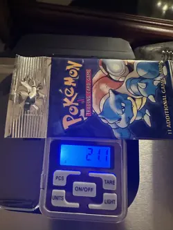 Pokemon Base Set Booster Pack 21.1 gram Unopened Factory Sealed 1999 Vintage - Image 1
