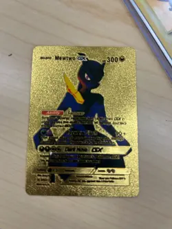 All gold mewtwo Pokemon card. In excellent condition. Would be a great addition - Image 1