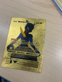 All gold mewtwo Pokemon card. In excellent condition. Would be a great addition - Image 2