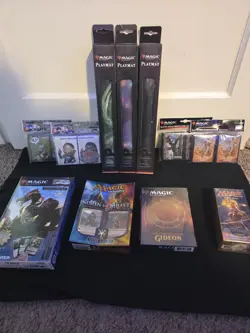 Magic the Gathering Lot- UP Sleeves/Playmats, Duel Decks, Spellbook, Event Deck - Image 1