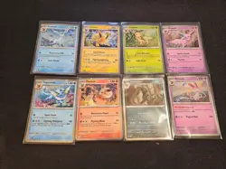 Prismatic Evolutions Costco Mini Tin Cosmos Promo Cards Set Of 8 - Image 1