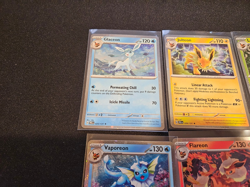 Prismatic Evolutions Costco Mini Tin Cosmos Promo Cards Set Of 8 - Image 2