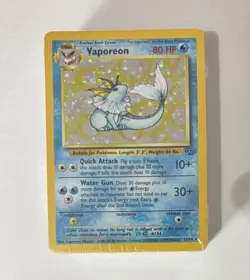 Pokemon TCG Vaporeon Holo Rare Card 12/64 Jungle Set, Vintage 1999 SEALED Deck - Image 1