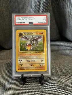 1999 Pokemon Fossil Aerodactyl Holo PSA 7 Number 1 - Image 1