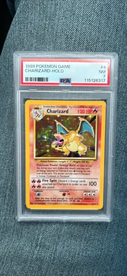 1999 POKEMON BASE SET UNLIMITED #4 CHARIZARD-HOLO PSA 7 - Image 1