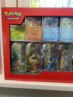 Pokemon TCG: Scarlet & Violet Prismatic Evolutions 8 Pack Mini Tin Set (Costco) - Image 2