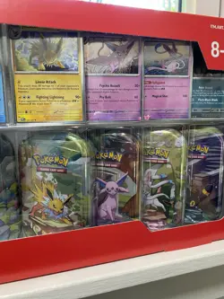 Pokemon TCG: Scarlet & Violet Prismatic Evolutions 8 Pack Mini Tin Set (Costco) - Image 3
