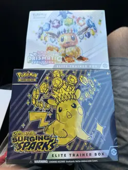Pokemon Center Prismatic Evolutions and Surging Sparks ETB Sealed - Image 1