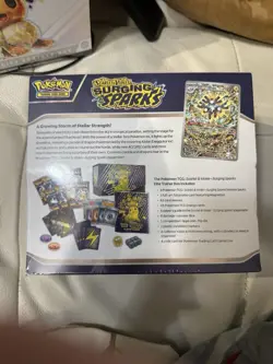 Pokemon Center Prismatic Evolutions and Surging Sparks ETB Sealed - Image 4