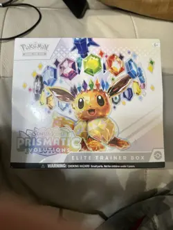 Pokemon Center Prismatic Evolutions and Surging Sparks ETB Sealed - Image 5