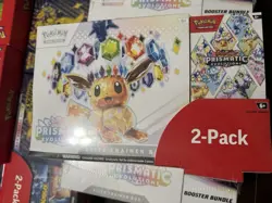 Pokemon Prismatic Evolutions Costco 2-Pack/tins/surging sparks bundles. - Image 1