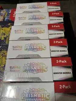Pokemon Prismatic Evolutions Costco 2-Pack/tins/surging sparks bundles. - Image 2