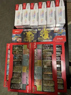 Pokemon Prismatic Evolutions Costco 2-Pack/tins/surging sparks bundles. - Image 3