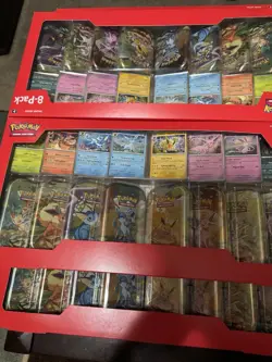 Pokemon Prismatic Evolutions Costco 2-Pack/tins/surging sparks bundles. - Image 5
