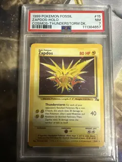 1999 Pokemon Fossil Zapdos #15 Cosmos Thunderstorm DK. Holo PSA 7 Vintage - Image 1