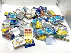 Lot Of Pokemon Mini Books And Sleeves - Image 1