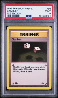 1999 POKEMON FOSSIL 1ST ED #60 GAMBLER PSA 9 - Image 1