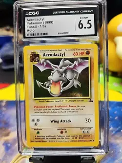 Pokemon Aerodactyl Holo 1/62 from Fossil Unlimited in a CGC 6.5!! - Image 1