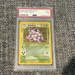 1999 POKEMON BASE SET UNLIMITED #11 NIDOKING-HOLO PSA 7 - Image 1
