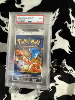 1999 Pokemon Base Set Booster Pack PSA 9 Charizard Art Thick Font WOTC Mint - Image 1