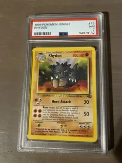 Pokemon TCG Rhydon Jungle 1st Edition Uncommon Card 45/64 Regular PSA 7 - Image 1