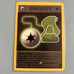 Potion Energy 1st Edition Team Rocket 82/82 Rare WOTC Vintage Pokemon Card NM - Image 1