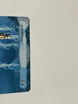 MTG Spreading Seas Wilds of Eldraine: Enchanting Tales Regular Misprint Fading - Image 2