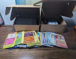 Bulk Lot 800+ Pokemon Cards from Various Sets including Cosmic Eclipse - Image 1