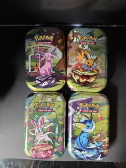 Prismatic Evolution - Scarlet & Violet - Pokemon - 4 Different Unopened Tins TCG - Image 1