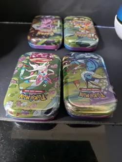 Prismatic Evolution - Scarlet & Violet - Pokemon - 4 Different Unopened Tins TCG - Image 4
