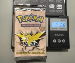 Pokemon ZAPDOS 1st Edition Fossil Booster Pack (WOC06071) HEAVY- 21.66g - Image 1