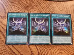 3x ROAR OF THE BLUE-EYED DRAGONS SDWD-EN019 Super Rare 1st Ed Playset x3 Yugioh - Image 1