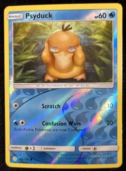 Psyduck 40/236 Cosmic Eclipse Sun & Moon Reverse Holo Pokemon TCG - NM - Image 1