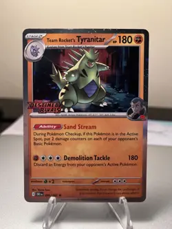 Team Rocket's Tyranitar 096/182-Pokemon: Destined Rivals Stamped Promo - Image 1