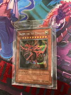 Yu-Gi-Oh! Slifer The Sky Dragon Dark Side of Dimensions Card YMA-EN001 NM Sealed - Image 1