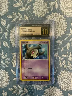 PRISTINE 10 CGC Duskull Pokemon (2005) EX Emerald - 46/106 - Image 1